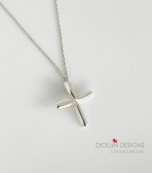 Pendant - Sculpted  "Cross" in S/S w. 16" Chain.