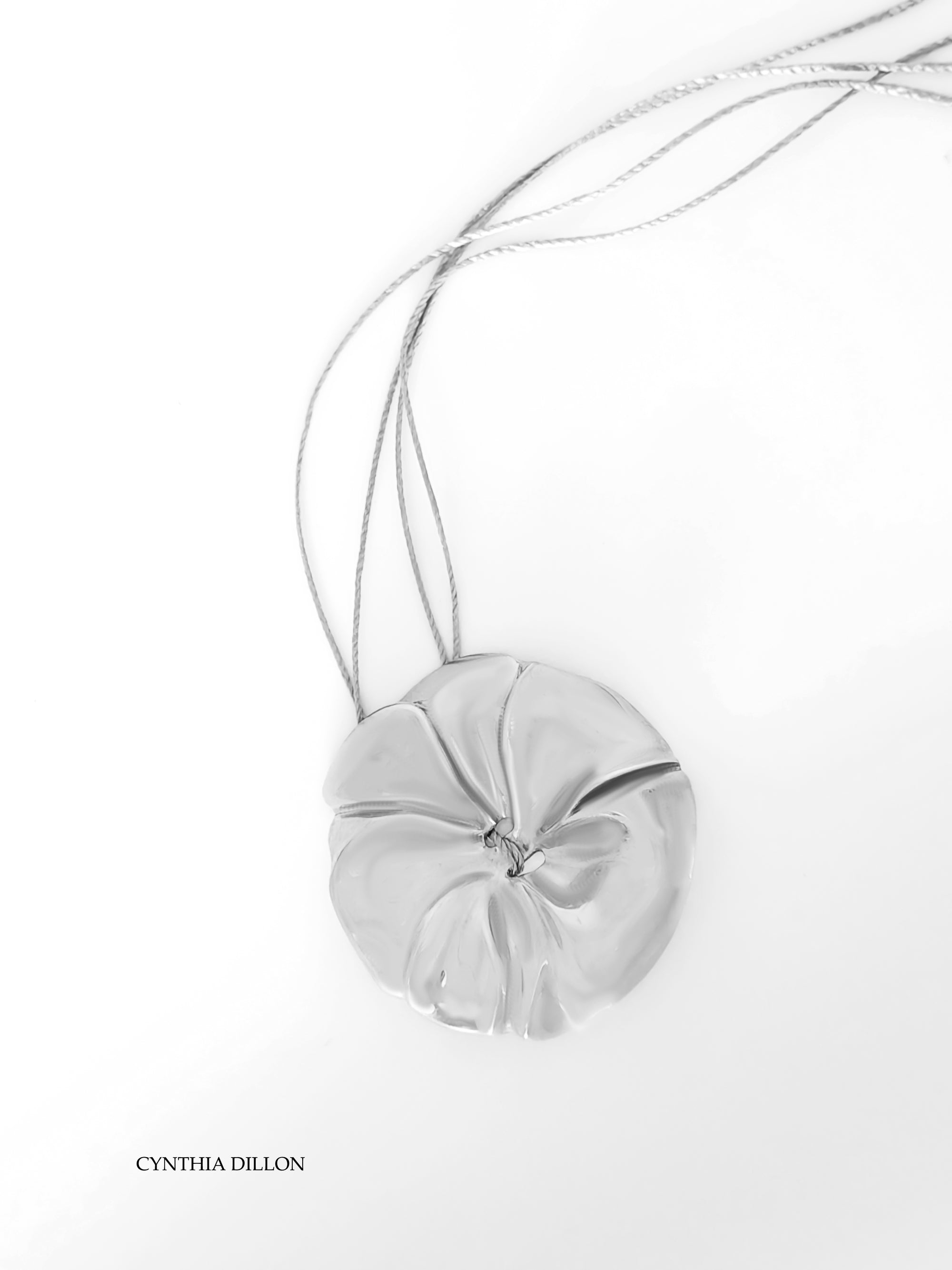 Pendant - Sculpted  "Flower" in S/S on a16"  Cord