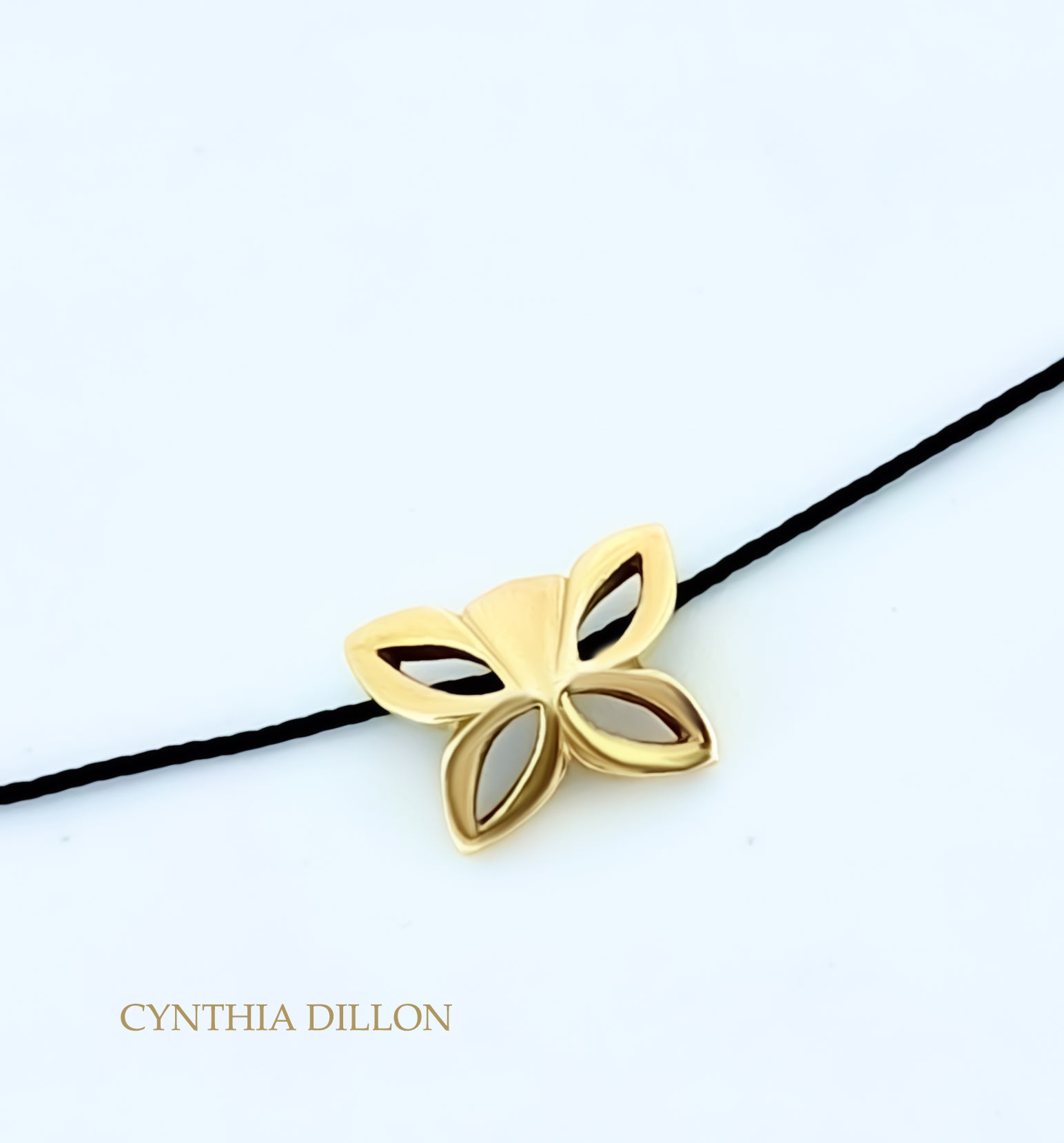 Pendant ~ Butterfly pendant in 18KT Gold with silk cord