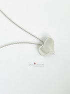 Pendant - Sculpted "Bent Heart" in S/S w. 16" Chain.