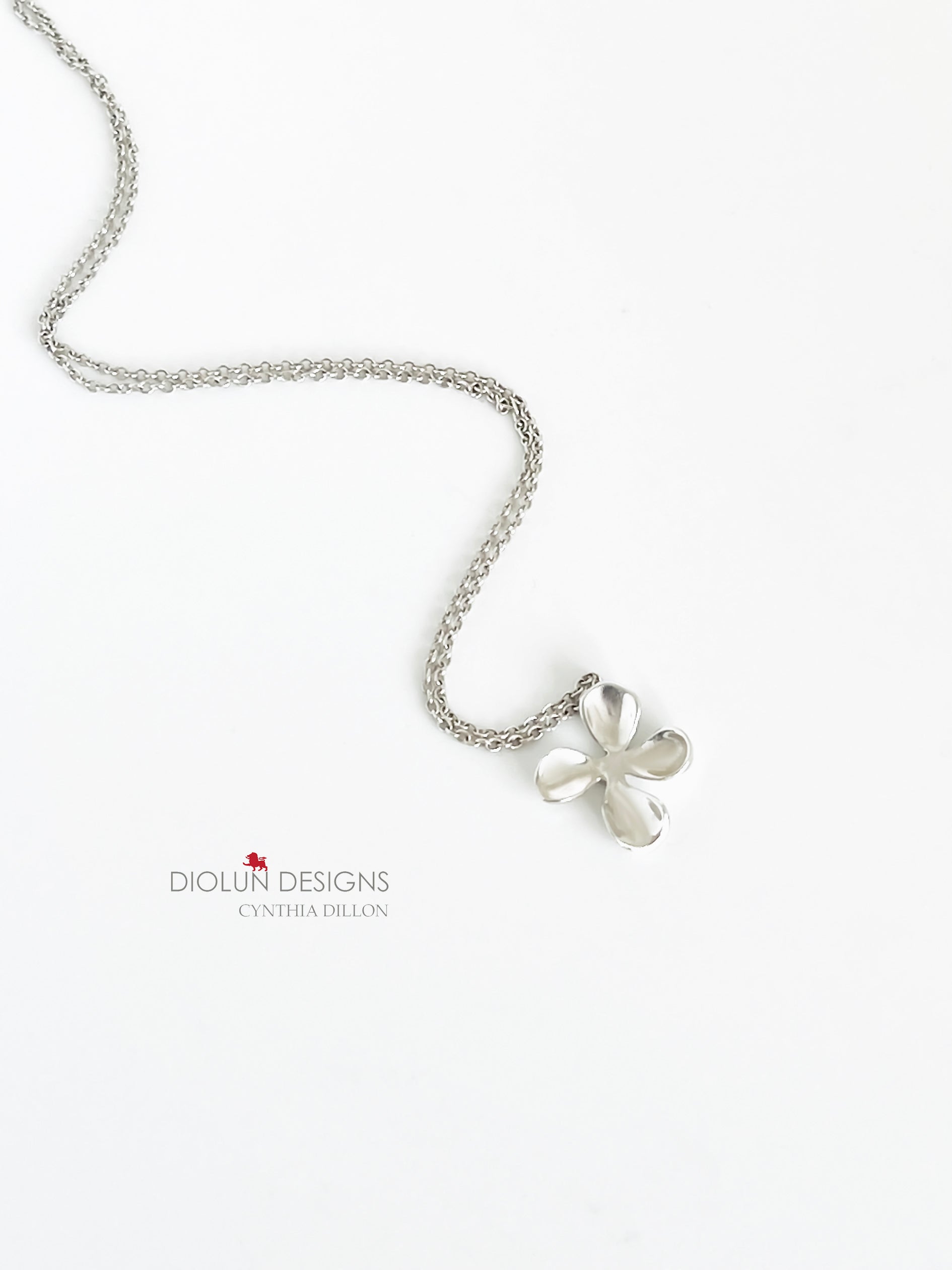 Pendant -  Sculpted "Flower - 4 Petals" Sculpted in S/S w. 16" Chain.