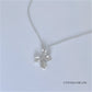 Pendant -  Sculpted "Flower - 4 Petals" Sculpted in S/S w. 16" Chain.