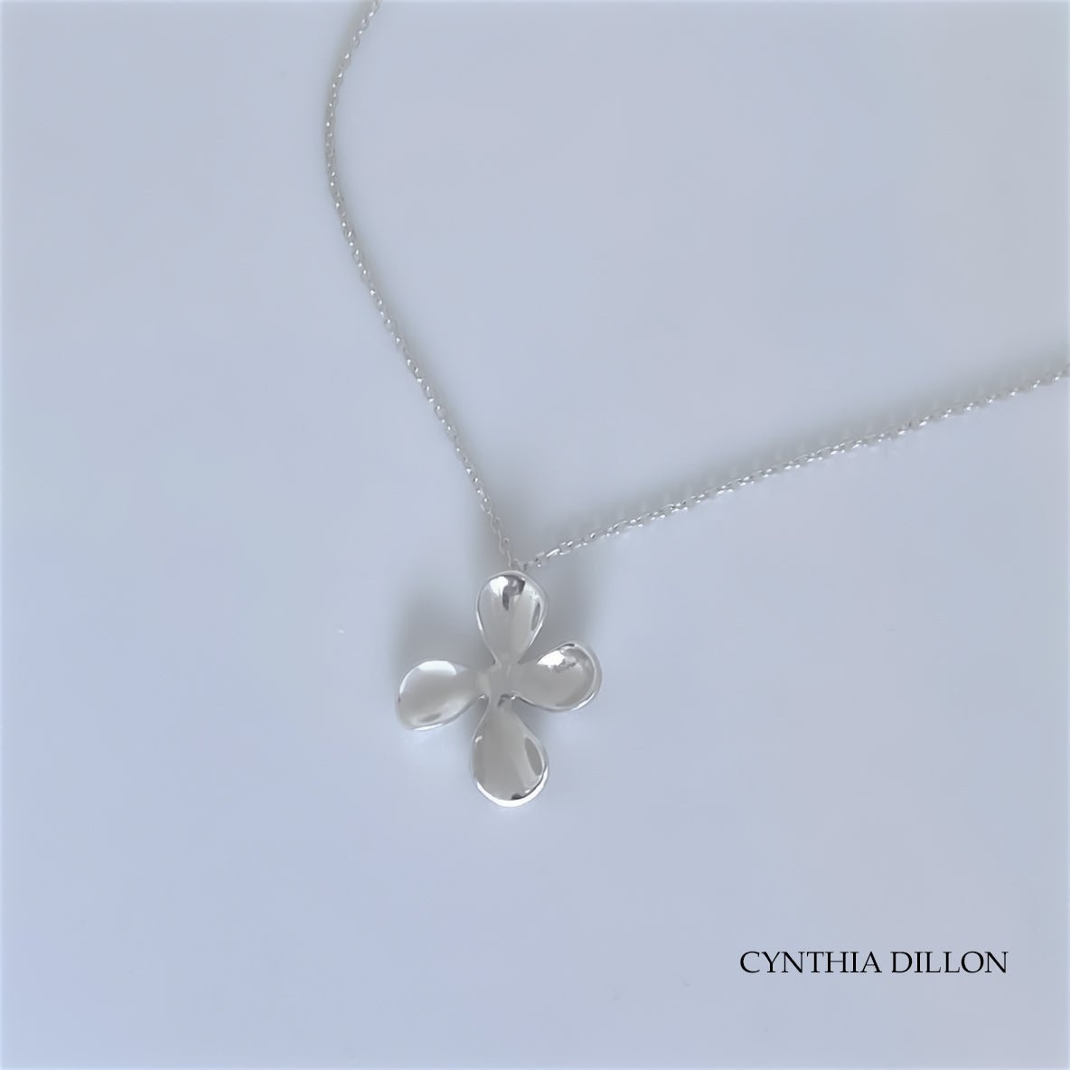 Pendant - Sculpted "Flower - 4 Petals" Sculpted in S/S w. 16" Chain.