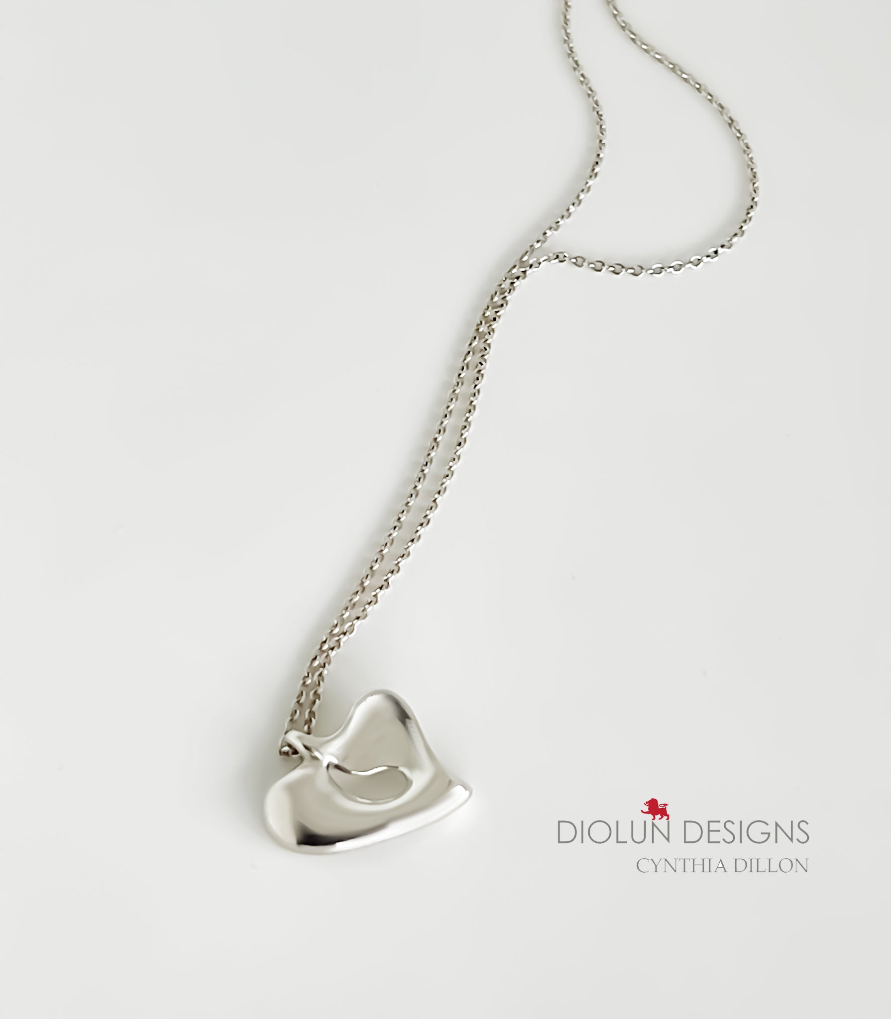 Pendant - Sculpted "Closed Heart w. Tear" in S/S w. 16" Chain. (Lge)