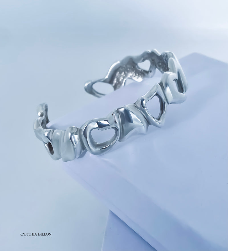 Bracelet - Sculpted "Hearts"   in Sterling Silver.