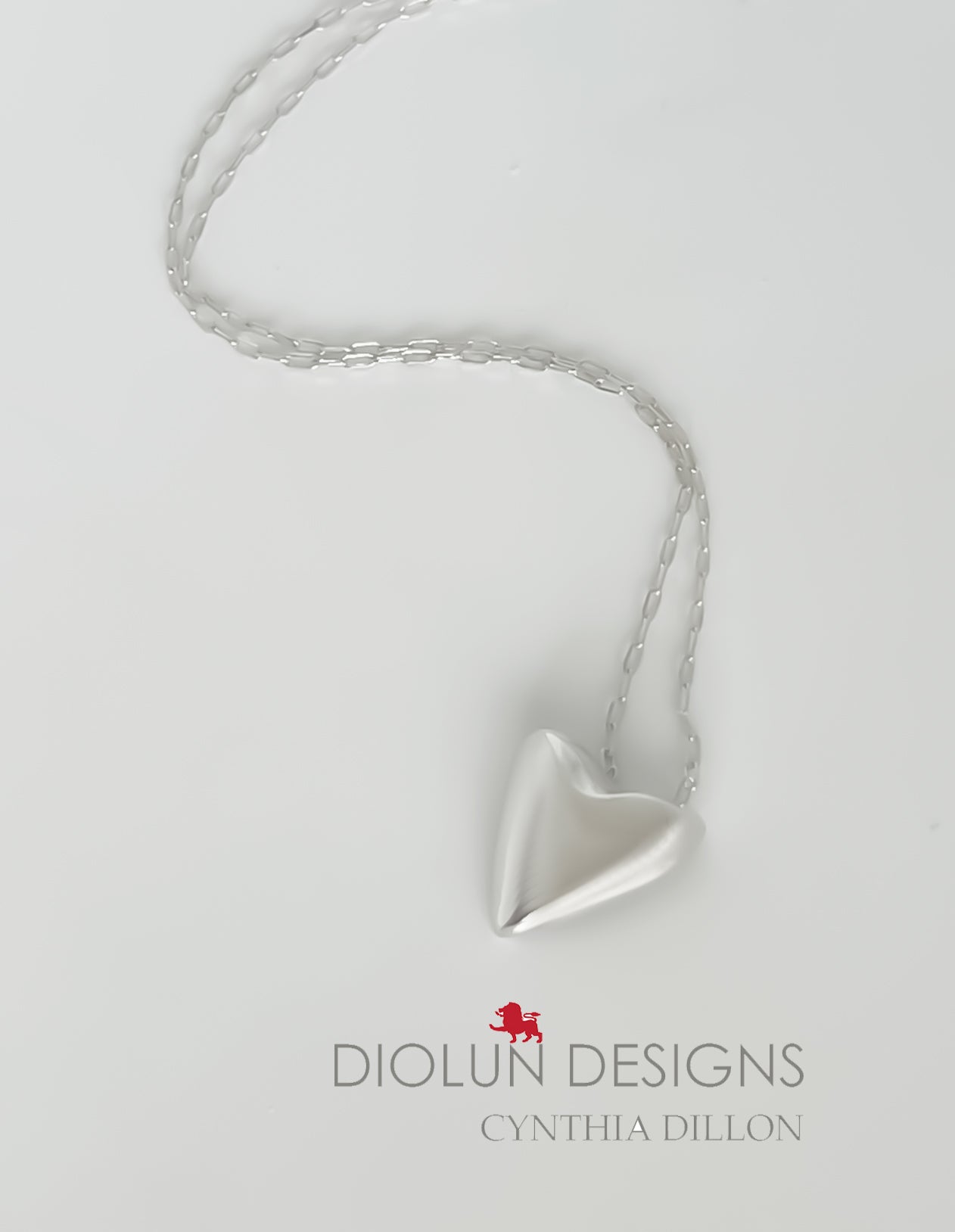 Pendant - Sculpted "Heart w. indentation"  in S/S w. 16" Chain.
